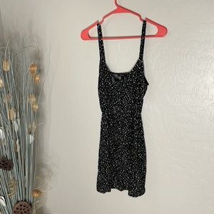 Forever 21 Juniors black mini dress with white polka dots in Size S.